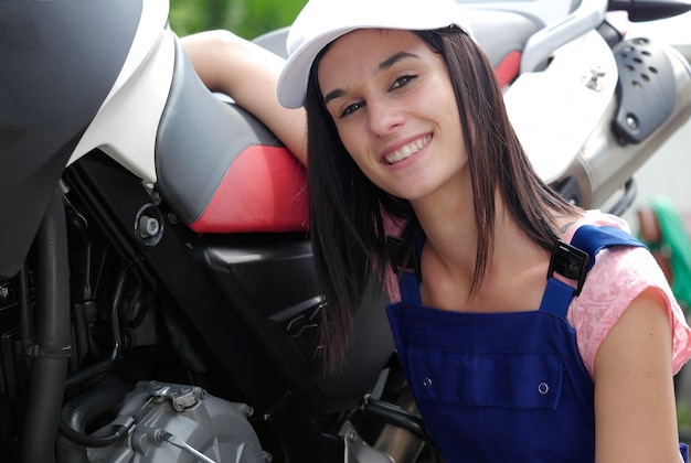 Student girl in motorbike mechanics