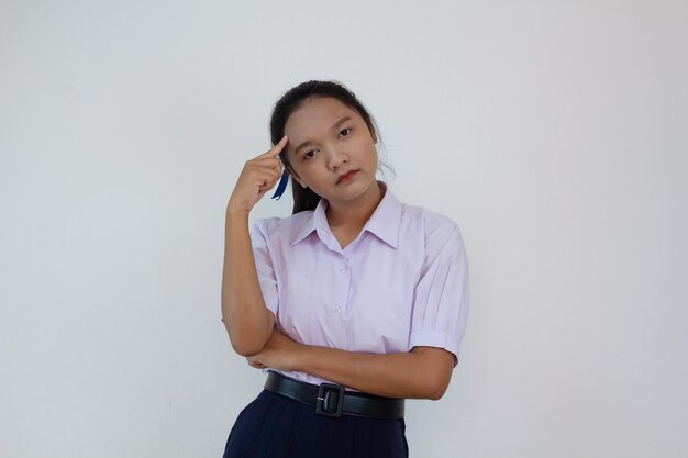 Student girl in uniform on white background