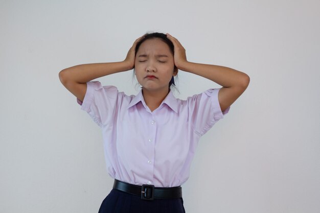 Student girl in uniform on white background