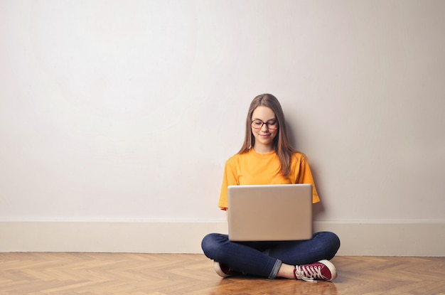 Student girl using a laptop