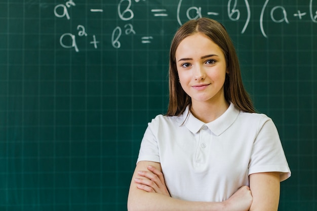 Student posing in maths class