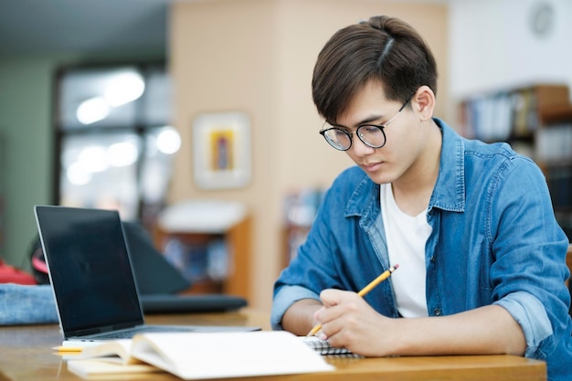 Student studying at library