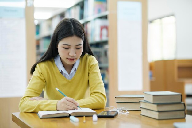 Student studying at library