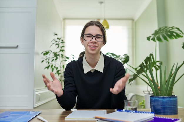 Student teenager talking looking at camera using video communication