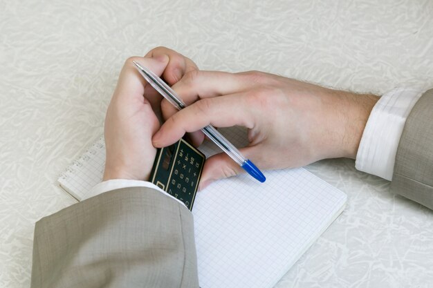 The student writes off the use of prohibited materials on the exam.