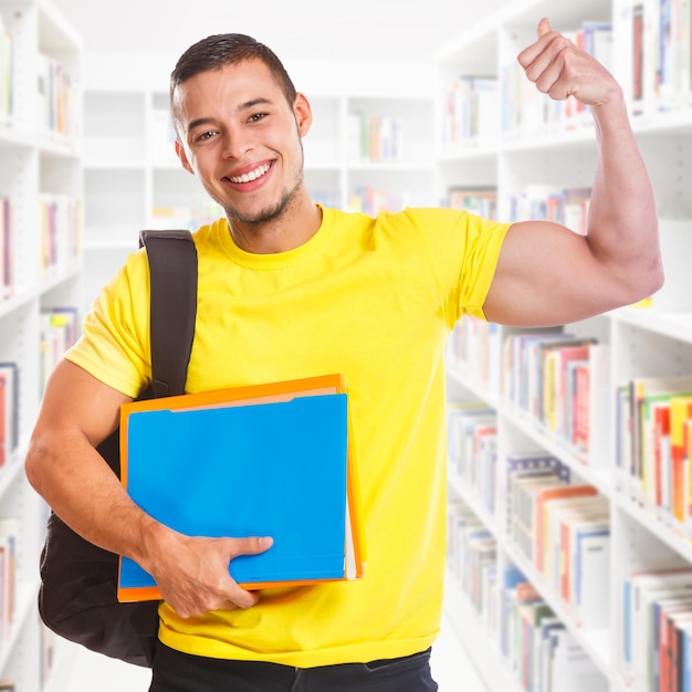 Student young man success successful square strong power library education people