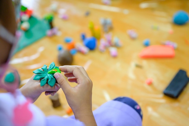 Students are making plasticine in the basic art class Children love art subjects and enjoy making clay and clay sculpting skills