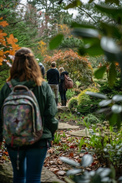 Photo students exploring botanical garden arboretum on educational tour of tree species and ecology