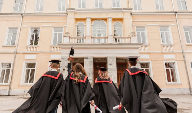 Students looking at university building