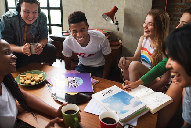 Students relaxing and doing homework together