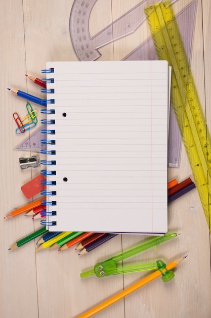 Students table with school supplies