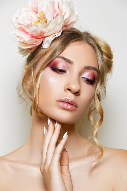 Studio portrait of a beautiful girl with makeup