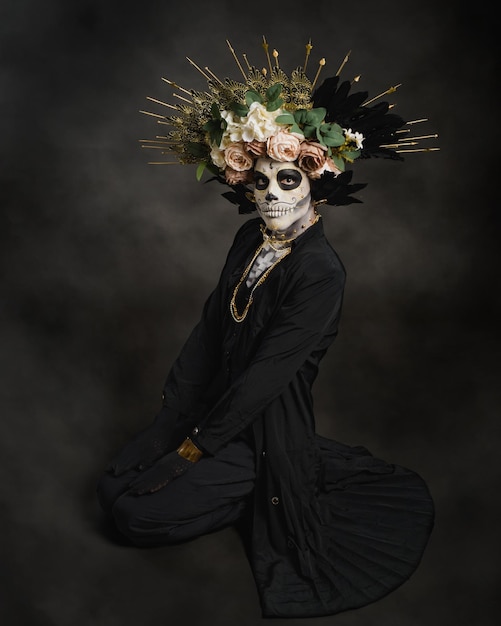 Studio portrait of Drag Queen catrin Catrin dressed in black with flower crown