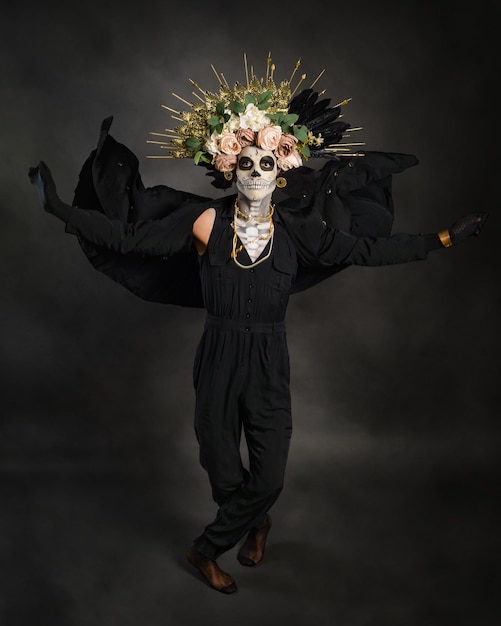 Studio portrait of Drag Queen catrin Catrin dressed in black with flower crown