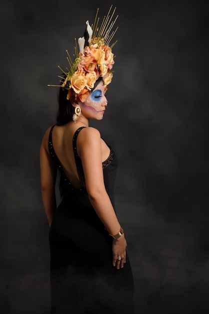 Studio portrait of a girl with catrina makeup