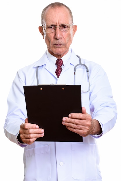 Photo studio portrait of senior man with short hair isolated against white