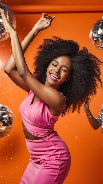 Studio shot of carefree beautiful young african american woman moves actively raises arms and feels