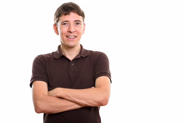 Studio shot of Caucasian man standing isolated against white background