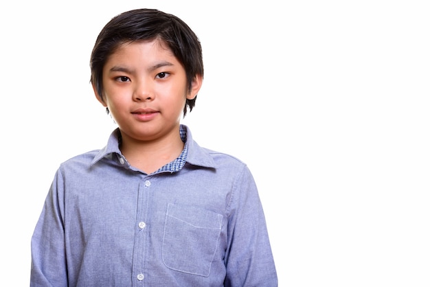 Studio shot of Japanese boy isolated against white background