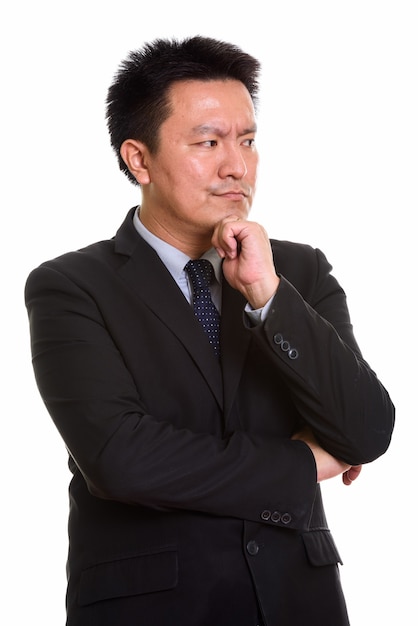 Studio shot of Japanese man isolated against white background