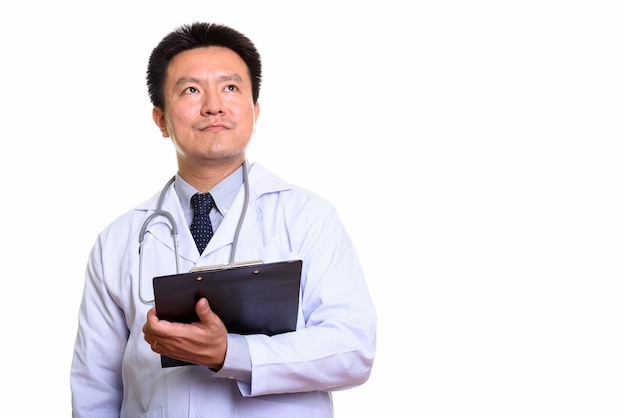 Studio shot of Japanese man isolated against white background