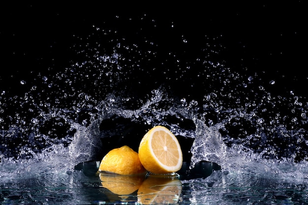 Studio shot with freeze motion of lemon in water splash