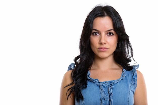 Studio shot of young beautiful Spanish woman