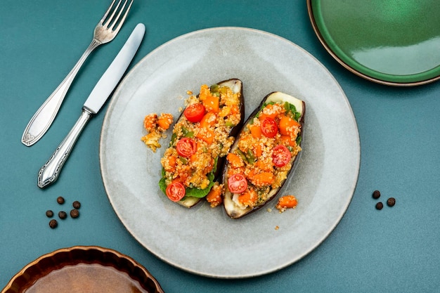 Stuffed aubergine with fried vegetables