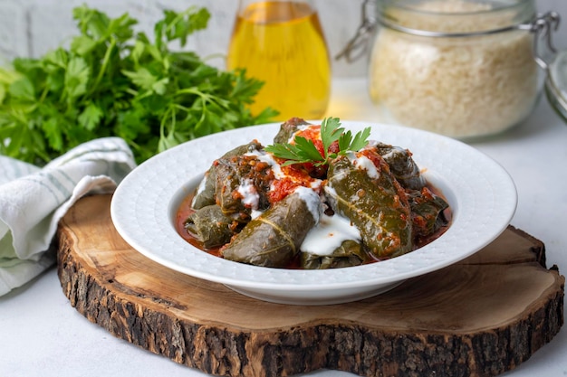 Stuffed collard greens with boiled leaves, traditonal turkish black sea region food, sarma, dolma (Turkish name; Kara lahana sarmasi)