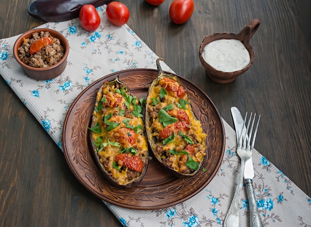 Stuffed Eggplant. Eggplant with minced meat, vegetables and herbs.