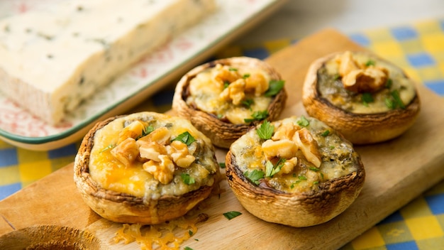 Stuffed mushroom with walnuts and blue cheese. Traditional Spanish tapa.