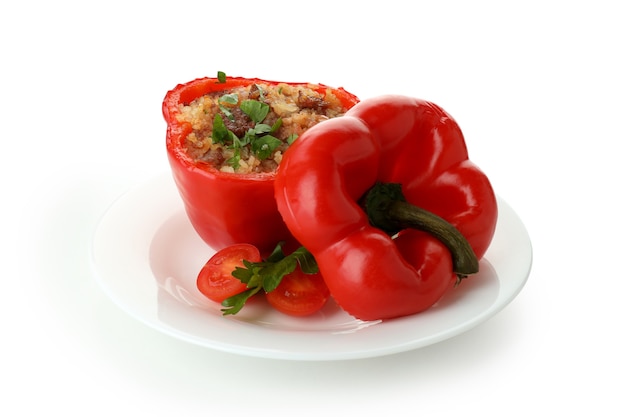 Stuffed pepper in plate isolated on white background