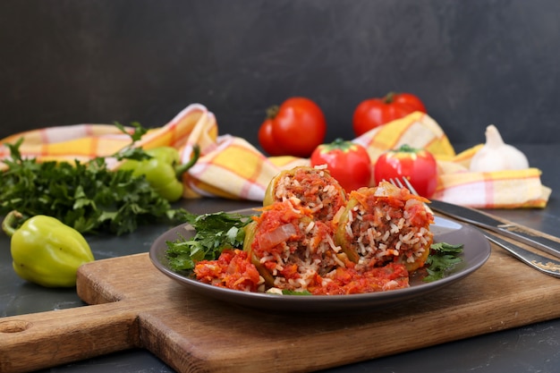 Stuffed peppers with meat, rice and tomato sauce 