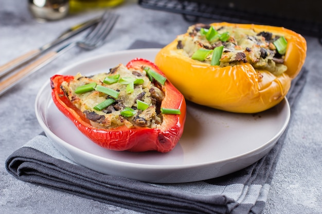 Stuffed peppers with vegetables - mashed potatoes, mushrooms champignons 