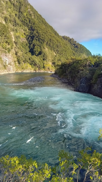 Stunning blue waters of Petrohue river and rapids in Puerto Varas Chile Saltos del Petrohue