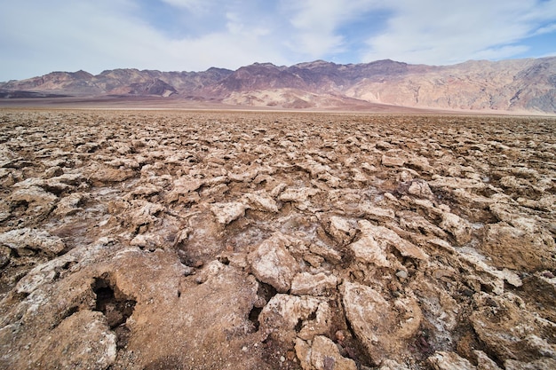 Stunning eroded salt formations in salt flats of desert plains