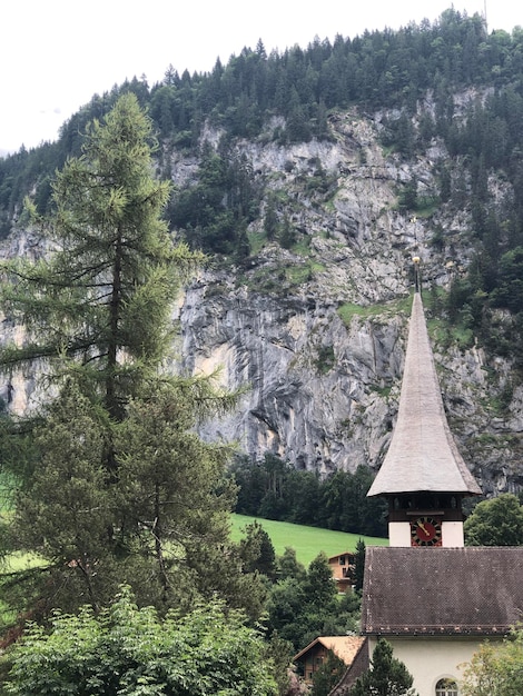 Stunning Lauterbrunnen valley view with a beautiful church, Swiss Alps, Switzerland