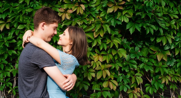 Stunning sensual outdoor portrait of young stylish fashion couple