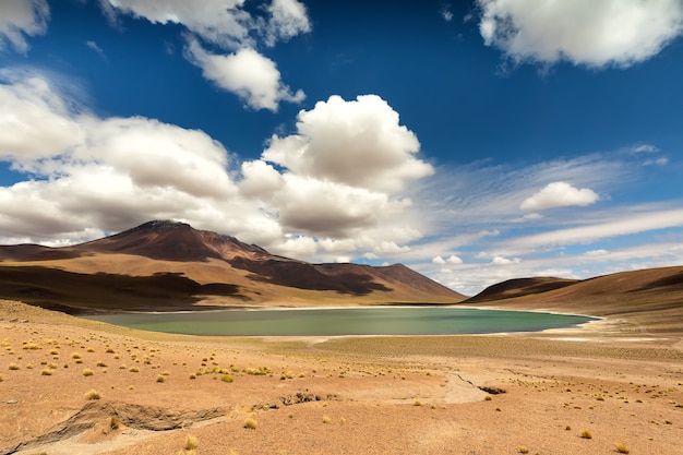 Stunning stormy sky  and Laguna Miniques. Atacama Desert. Chile.  South America