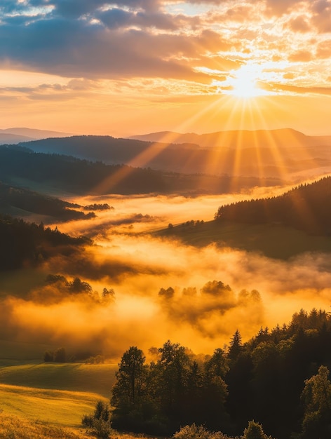 Photo stunning sunrise over a fogcovered valley with warm golden light