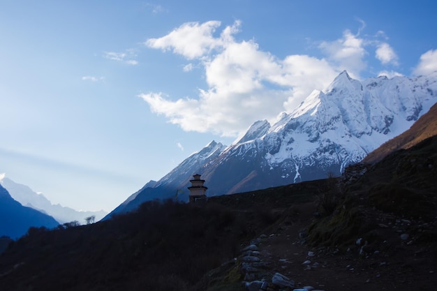 Stupa among stone houses in the Manaslu region. Himalayas