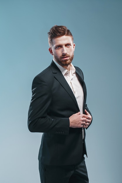 Stylish bearded man in elegant suit