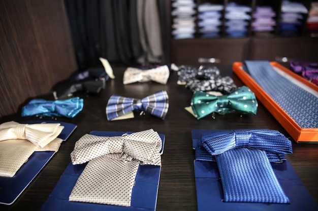 Stylish bow ties at menswear store closeup