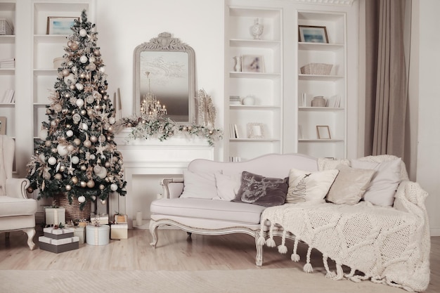 Stylish Christmas decorated interior cozy living room with New year tree Merry Christmas eve at home