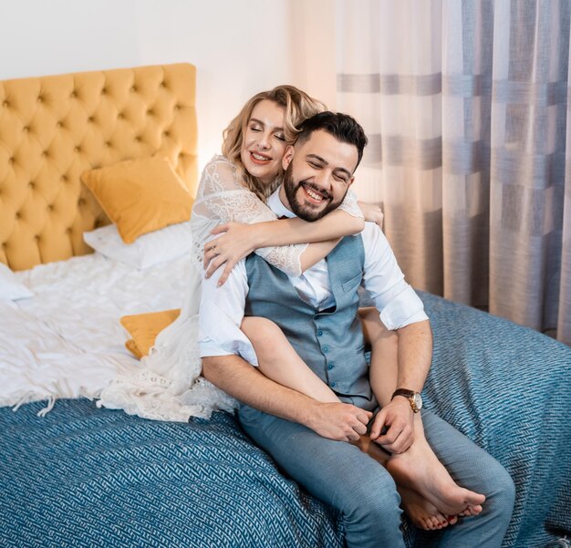 Stylish couple in love talking in interior studio