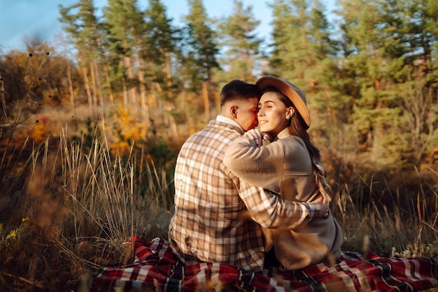 Stylish couple walking and enjoying autumn weather People relaxation and vacations concept