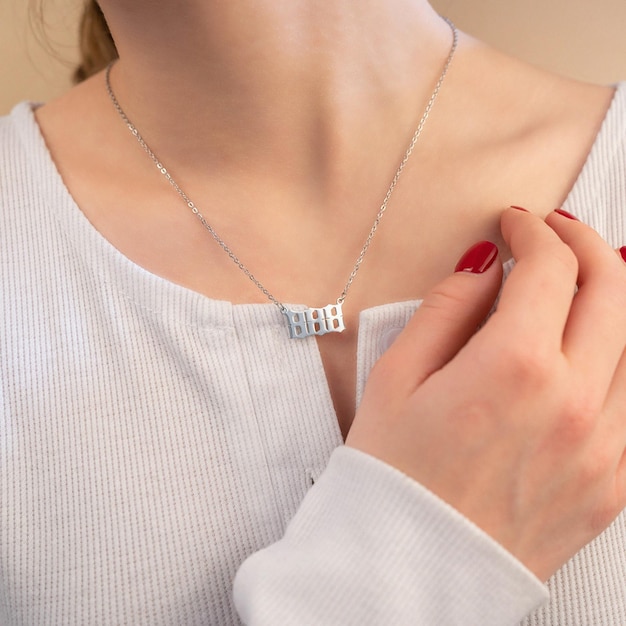 Stylish elegant necklace on the neck of the girl