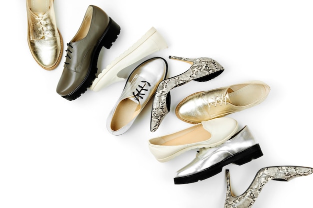 Stylish female spring or autumn shoes in gold and silver colors Beauty and fashion concept