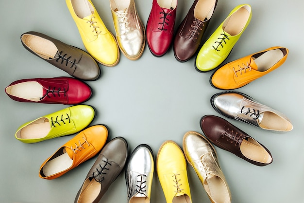 Stylish female spring or autumn shoes in various colors. Beauty and fashion concept. Flat lay, top view. Copy space