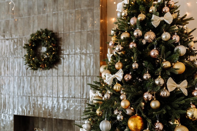 Stylish interior of living room with decorated Christmas tree